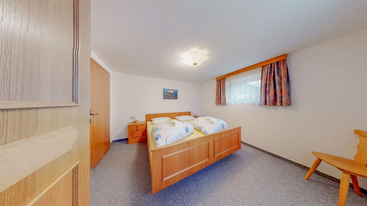 Schlafzimmer im Apartment Alpenruhe